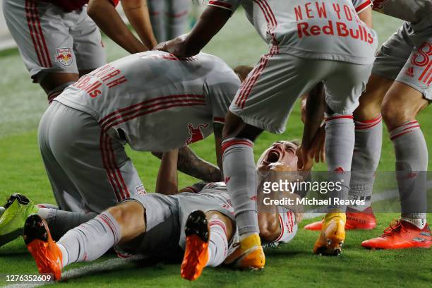 Ben Mines of New York Red Bulls celebrates with teammates after scoring a goal during the 85' against Inter Miami CF at Inter Miami CF Stadium on...