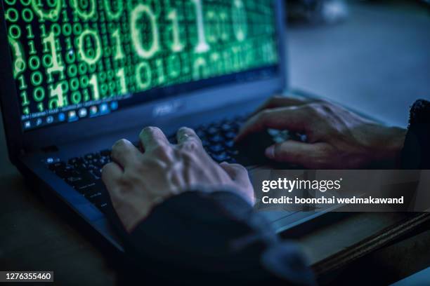 hacker stealing password and identity, computer crime. - corporate theft photos et images de collection