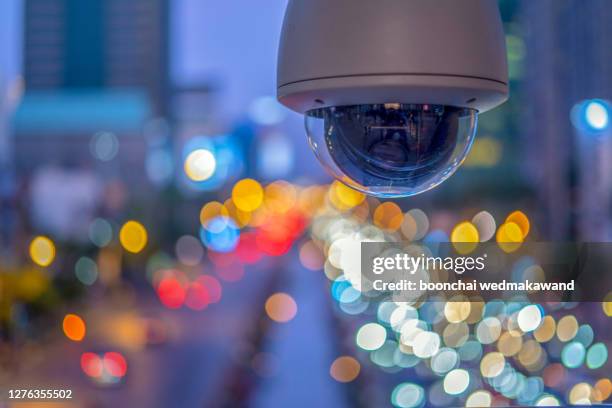 cctv watching bad traffic at night in thailand - highway patrol stock-fotos und bilder