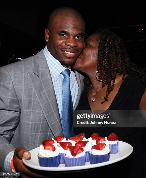 Bryant Johnson of the Detroit Lions celebrates his 30th birthday with his mother at Room Service on March 7, 2011 in New York City.