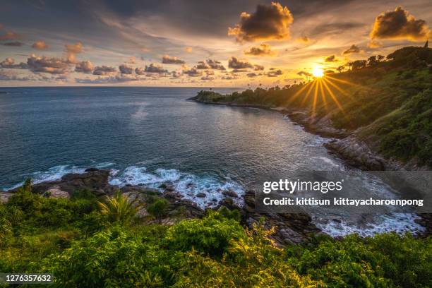 beautiful sunset at promthep cape ,phuket - kapen stockfoto's en -beelden