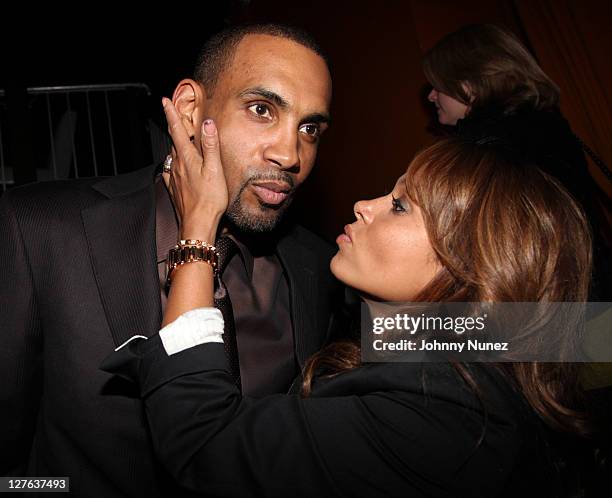 Executive Producer and NBA Player Grant Hill and wife, recording artist Tamia Hill attend the premiere of "Starting at the Finish Line: The Coach...