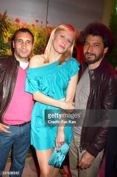 Actors Zinedine Soualem, Anna Sherbinina and director Radu Mihaileanu attend the Escada Cocktail Event at Escada Store Montaigne on May 2, 2011 in...