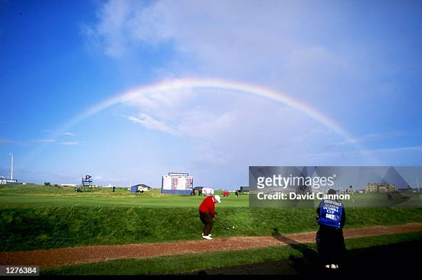 Rainbow over St Andrews as John Daly of the USA chips up during the Alfred Dunhill Cup in Scotland. \ Mandatory Credit: David Cannon /Allsport