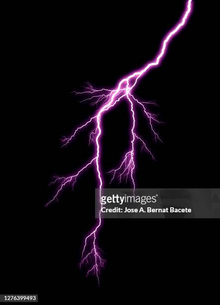 energy, lightning on black background. - lightning purple stock pictures, royalty-free photos & images