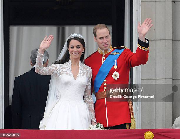 Catherine, Duchess of Cambridge and Prince William, Duke of Cambridge greet well-wishers from the balcony at Buckingham Palace on April 29, 2011 in...