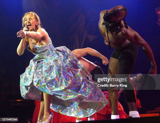 Singer Kylie Minogue performs live during her "Aphrodite Les Follies" tour at the O2 Arena on April 12, 2011 in London, England.