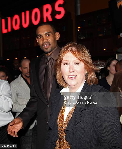 Executive Producer and NBA Player Grant Hill and producer Ann Rubenstein Tisch attend the premiere of "Starting at the Finish Line: The Coach Buehler...
