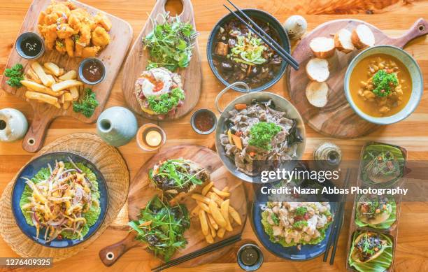 asian fusion food background. - fusion food stock pictures, royalty-free photos & images