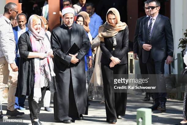 Imam Gamal Fouda of Al Noor Mosque and New Zealand Prime Minister Jacinda Ardern look on before they unveil a plaque at Al Noor Mosque on September...