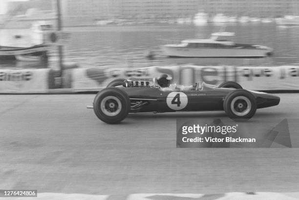 British racing driver Jim Clark driving a Team Lotus car during the qualifying rounds for the Monaco Grand Prix in Monte Carlo, Monaco, 20th May 1966.