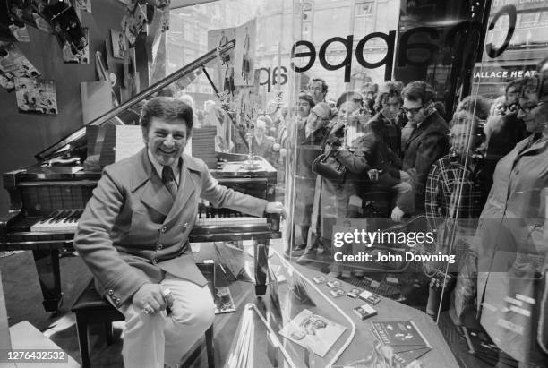 American pianist Liberace in the music store Chappell of Bond Street, London, October 1972. He is in the capital to appear in the Royal Variety...