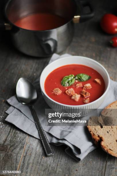 homemade tomato soup with bread croutons - comfort food stock pictures, royalty-free photos & images