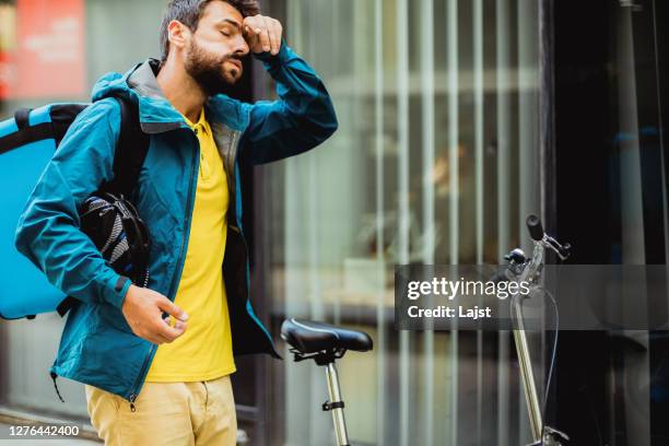 hard-pressed - sighing stock pictures, royalty-free photos & images