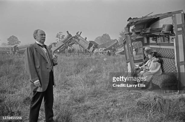 English actor Sir Ralph Richardson at the site of a train crash staged for the comedy film 'The Wrong Box', UK, 6th October 1965.