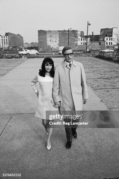 English actor Michael Caine and American actress Anjanette Comer in Berlin, Germany, during the filming of the Harry Palmer spy drama 'Funeral in...