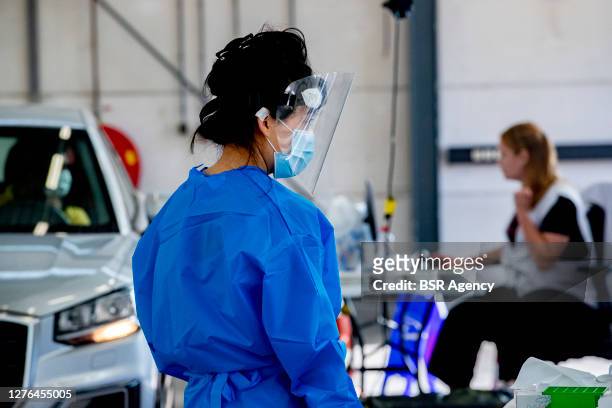 Medical worker is seen at a corona test location on September 22, 2020 in Utrecht, Netherlands. There is a shortage of test capacity in the country,...