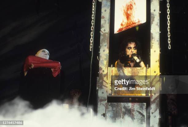 Alice Cooper performs with a guillotine at the Roy Wilkins Auditorium in St. Paul, Minnesota on February 7, 1987.