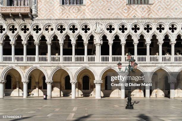 facade of the doge's palace on the san marco square in venice, italy - doge's palace venice stock pictures, royalty-free photos & images