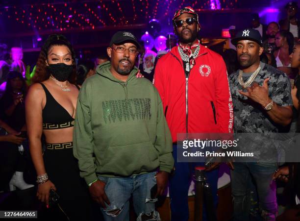La La Anthony, John Monopoly, 2 Chainz and DJ Clue attend T.O. Green Signing Party at Gold Room on September 23, 2020 in Atlanta, Georgia.