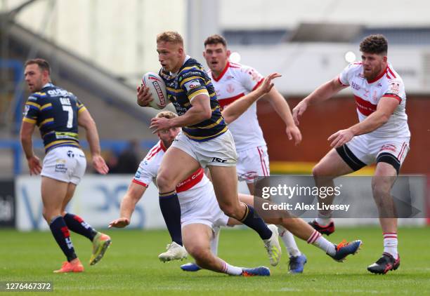 Mikolaj Oledzki of Leeds Rhinos breaks through the Hull Kingston Rovers defence during the Betfred Super League match between Hull Kingston Rovers...