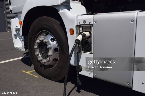 charging process in electric truck - fleet of vehicles stock pictures, royalty-free photos & images