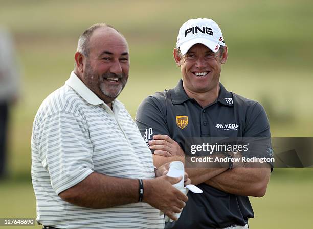 Lee Westwood of England and Andrew Chubby Chandler on the sixth hole during the second round of The Alfred Dunhill Links Championship at the...