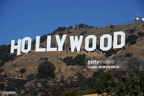 View of the Hollywood sign from a street in a residential Hollywood Hills section of Hollywood, California, 21 September 2011. It is one of the...