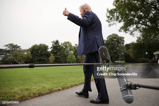 President Donald Trump gestures after talking to journalists before departing the White House September 24, 2020 in Washington, DC. Trump is...