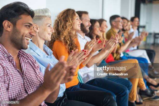 applause - crowd applauding stock pictures, royalty-free photos & images