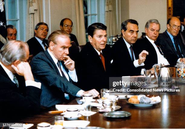 View of US President Ronald Reagan as he meets with bipartisan Congressional leaders in the White House's Cabinet Room, Washington DC, November 12,...