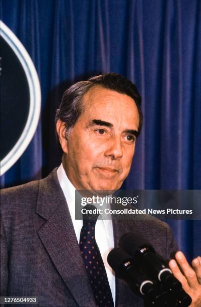 American politician and US Senate Minority Leader Bob Dole speaks from the podium in the White House's Brady Press Briefing Room, Washington DC,...