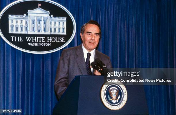 American politician and US Senate Minority Leader Bob Dole speaks from the podium in the White House's Brady Press Briefing Room, Washington DC,...