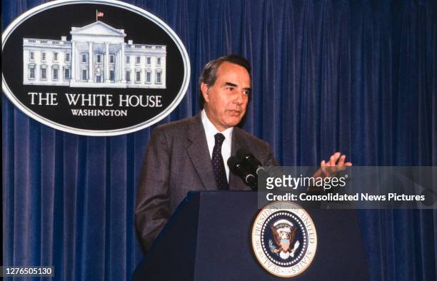 American politician and US Senate Minority Leader Bob Dole speaks from the podium in the White House's Brady Press Briefing Room, Washington DC,...