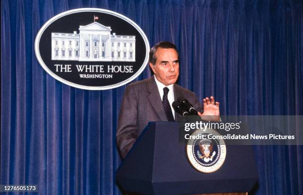 American politician and US Senate Minority Leader Bob Dole speaks from the podium in the White House's Brady Press Briefing Room, Washington DC,...