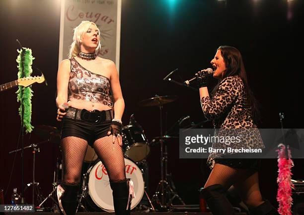 Jenna Cougar and Kelly Cougar of Cougar perform at the release party for Britney Spears' new album "Femme Fatale" at The Portage Theater on March 28,...