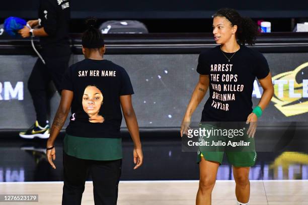 Alysha Clark and Jewell Loyd of the Seattle Storm both wear "say her name" t-shirts prior to Game Two of their Third Round playoff against the...
