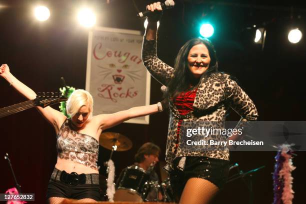 Jenna Cougar and Kelly Cougar of Cougar perform at the release party for Britney Spears' new album "Femme Fatale" at The Portage Theater on March 28,...