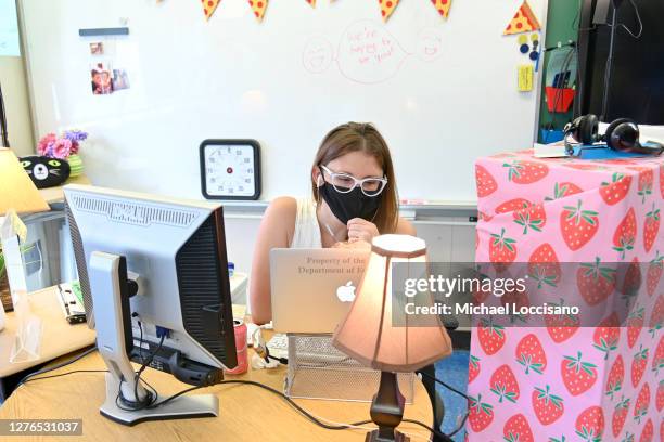 Teacher wears a mask and teaches remotely from her classroom on September 24, 2020 in New York City. New York City, the nation's largest school...