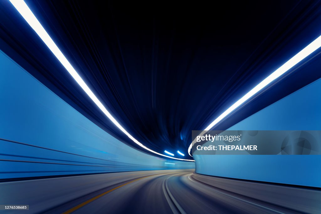 Driving on empty traffic tunnel during pandemic 2020