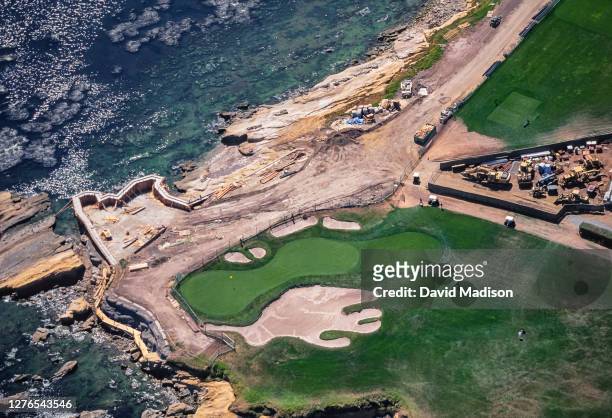 An aerial view of the 17th and 18th holes at Pebble Beach Golf Links during reconstruction of the 18th tee area in July 1997 in Pebble Beach,...