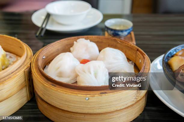 close-up of guangdong dum sum named shrimp dumpling in the restaurant - dim sum meal stock pictures, royalty-free photos & images