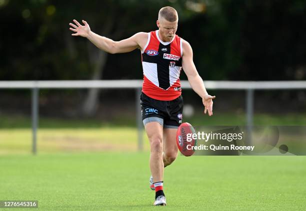 Dan Hannebery of the Saints kicks during a St Kilda Saints AFL training session at Maroochydore Multi Sport Complex on September 25, 2020 in Sunshine...