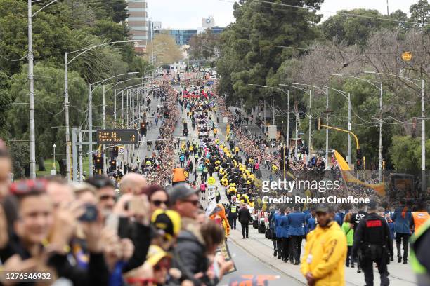 General view as fans line the parade route during the 2019 AFL Grand Final Parade on September 27, 2019 in Melbourne, Australia.
