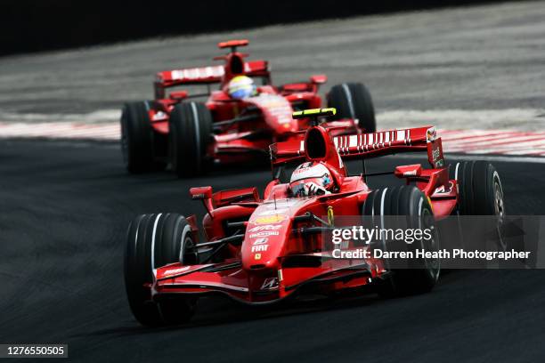 Finnish Ferrari Formula One driver Kimi Raikkonen driving his Ferrari F2007 car ahead of his Brazilian teammate Felipe Massa during the 2007...