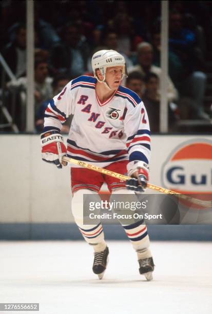 Brian Leetch of the New York Rangers skates against the New Jersey Devils during an NHL Hockey game circa 1991 at the Brendan Byrne Arena in East...