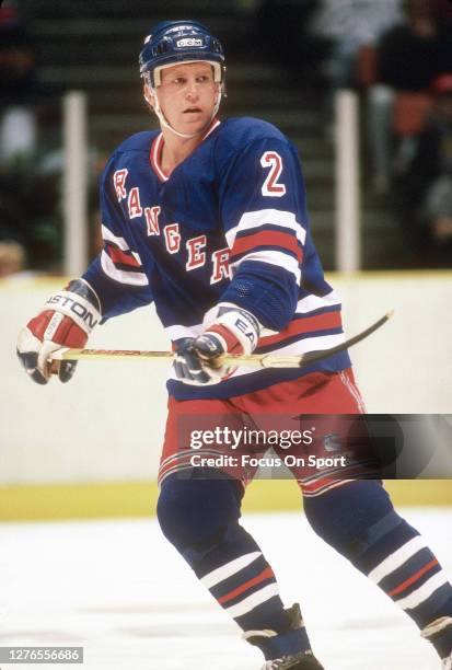 Brian Leetch of the New York Rangers skates against the New Jersey Devils during an NHL Hockey game circa 1990 at the Brendan Byrne Arena in East...