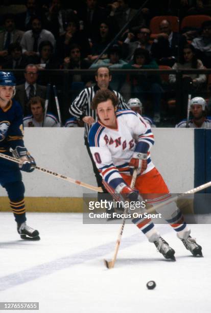 Ron Duguay of the New York Rangers skates against the Buffalo Sabers during an NHL Hockey game circa 1980 at Madison Square Garden in the Manhattan...