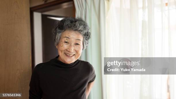 portrait of a japanese senior woman - reportage home stock pictures, royalty-free photos & images