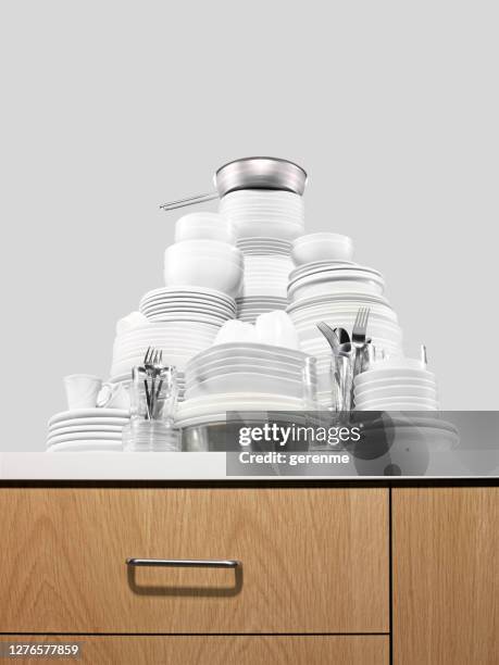 clean dishes - dirty dishes stock pictures, royalty-free photos & images